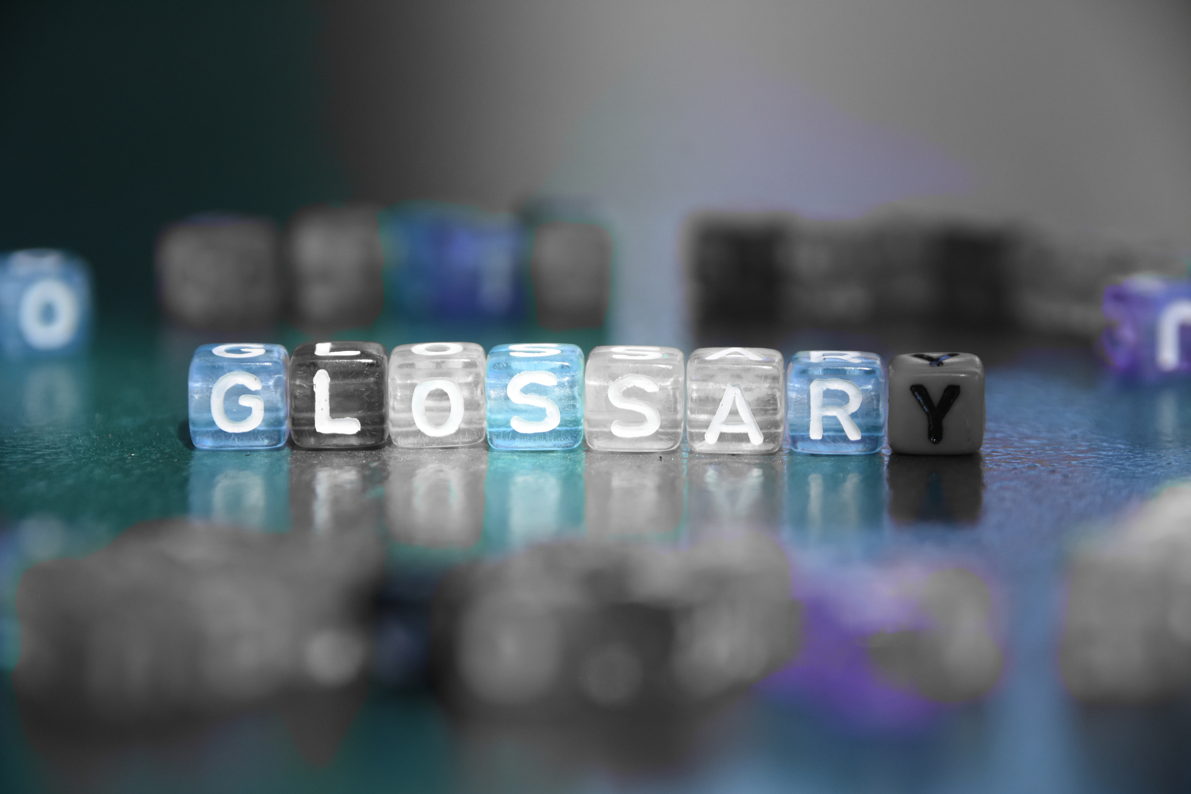 Word GLOSSARY made of letter cubes